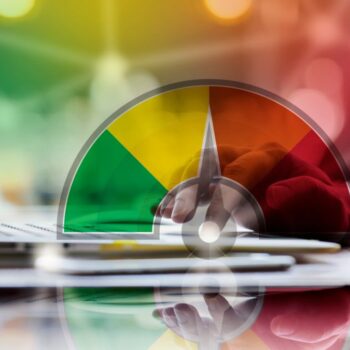 A keyboard with a glowing SEO credit score symbol representing the importance of optimizing your blog for search engine visibility.